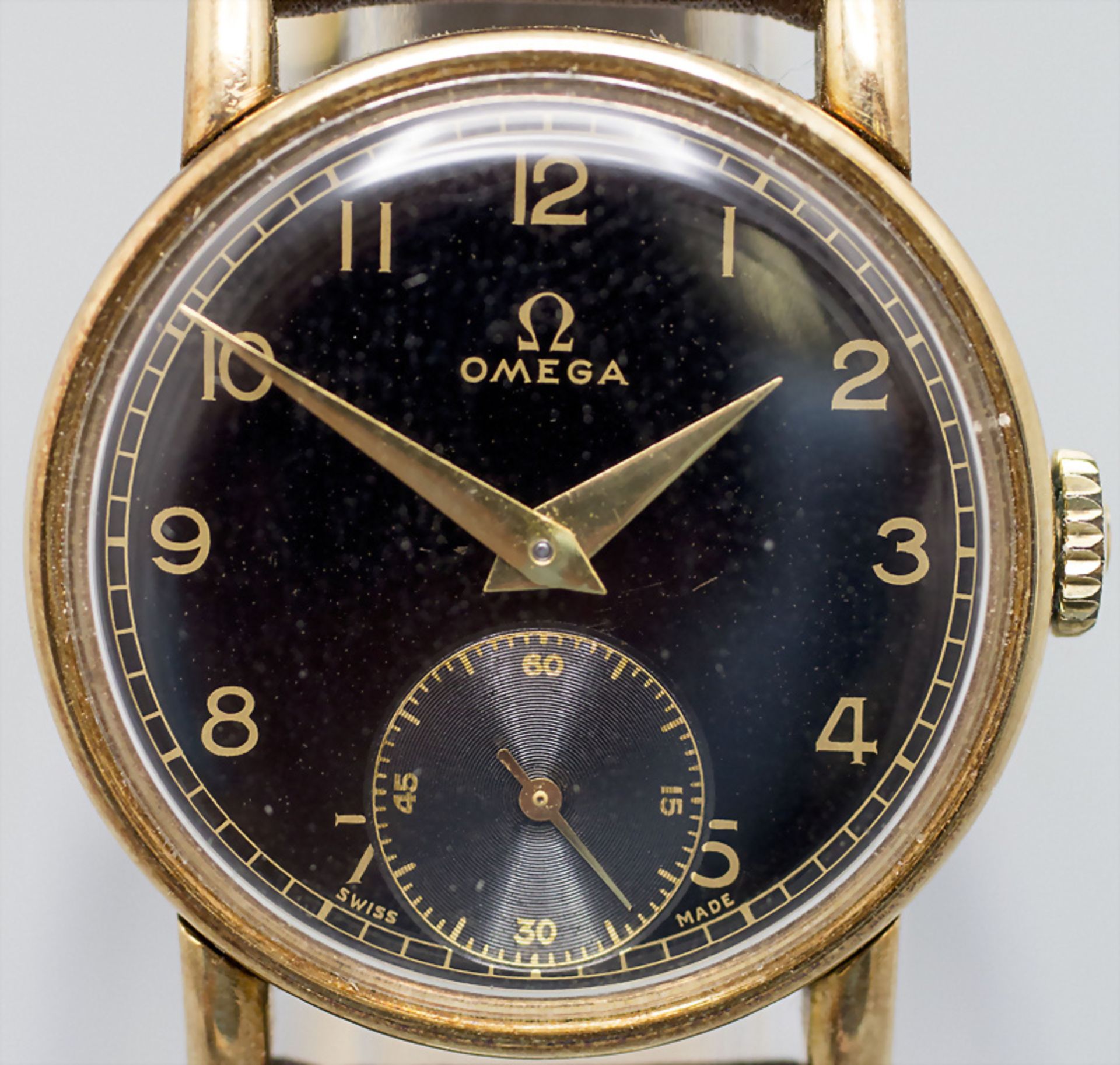 Beobachtungsuhr / A military 14 ct gold watch, Omega, Swiss, um 1939-1944
