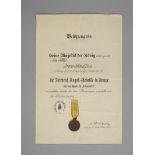 Friedrich-August-Medaille und Verleihungsurkunde