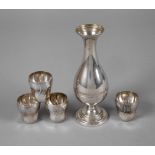Vase und vier Becher Silber