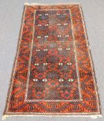 Belutsch Teppich mit Schneeflocken Muster. Antik.