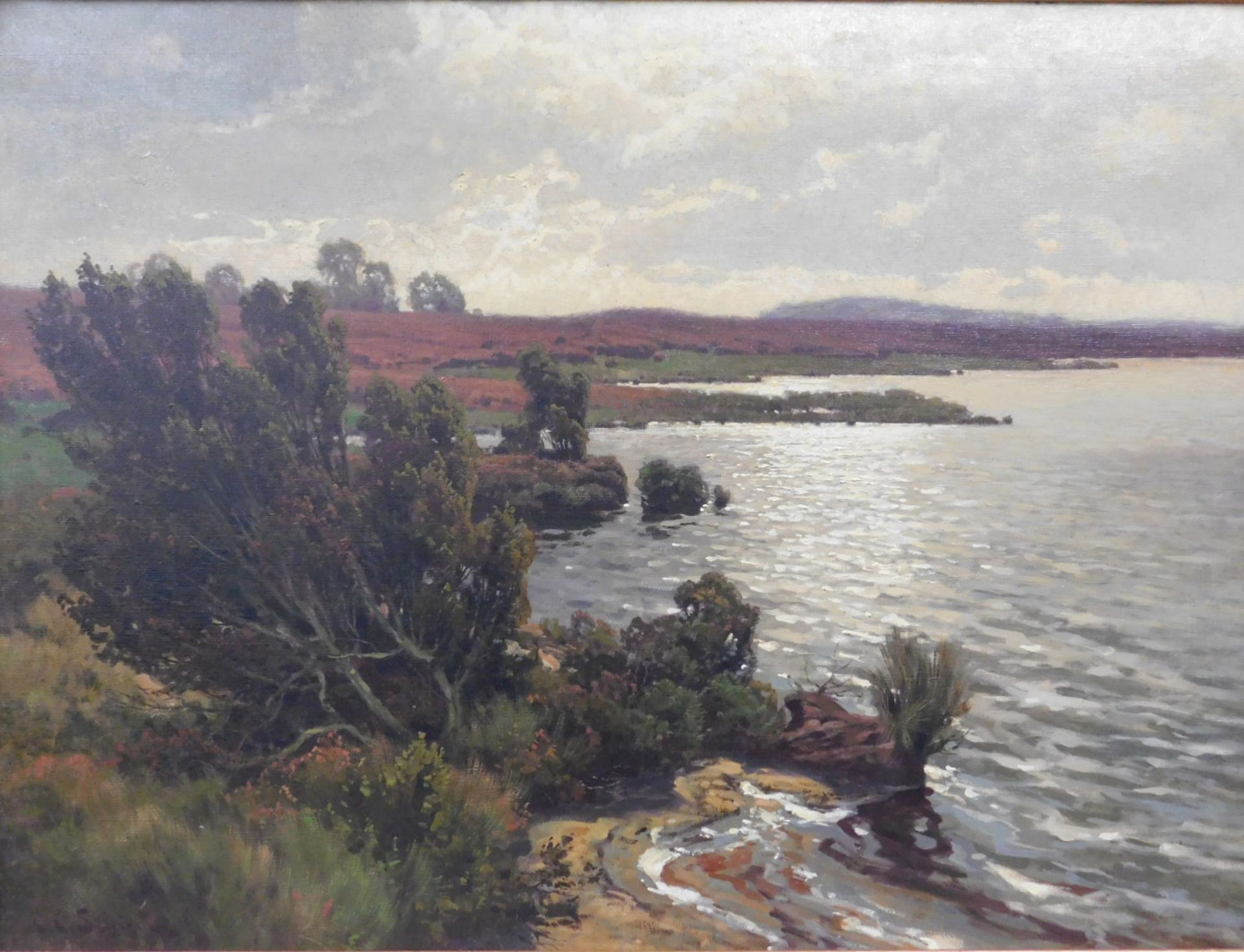 Carl C. SCHIRN (1852 - 1928). Ziehende Wolken über einem Heidesee.