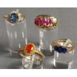 4 Ringe Gold 585 mit Steinen (Aquamarin, Rubin, Diamant, Saphir).