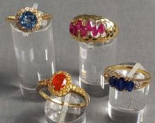 4 Ringe Gold 585 mit Steinen (Aquamarin, Rubin, Diamant, Saphir).