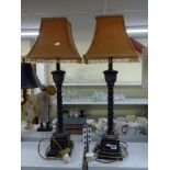 A large pair of table lamps with beaded shades in the Regency style modelled as palm trees on stands