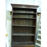 A large handsome Edwardian open bookcase with five adjustable shelves between fluted ends (130cm max