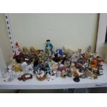 A collection of small animal and other figurines including Leonardo collection teddy bears, dogs,