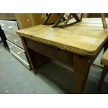 A late Victorian pine dining table with a drawer on square tapering legs and a Victorian part-