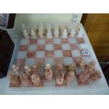 A modern chess set in pink and white stone, with matching board [C] WE DO NOT TAKE CREDIT CARDS OR