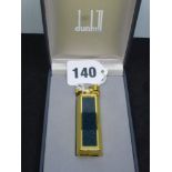 A Dunhill Sylphide lady's gas cigarette lighter in vintage style, in gilt metal and mottled blue