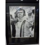 A selection of six framed motor racing-related pictures including a signed photograph of Steve