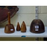 Treen, comprising: a vintage carved wood hat block, a beech and oak mallet, and two probable plumb-