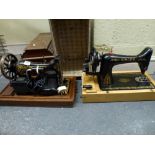 Two vintage cased Singer sewing machines, one with registration number 368525 [under s82] WE DO
