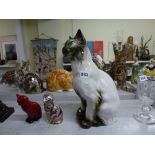 A modern Royal Dux figure of a seated Siamese cat, model 635; together with a Royal Crown Derby