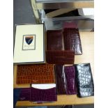 A group of Aspinal leather gifts unused with fitted boxes comprising seven various wallets, credit