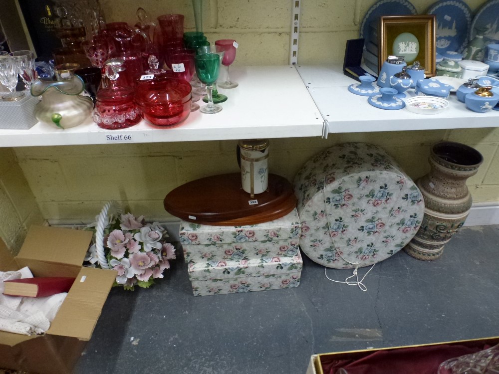 A mixed lot including a floral decorated hatbox and two matching boxes and covers, a German