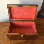 A Regency burr yew tea box with holly stringing and brass basket handles to sides, altered, 23 x