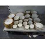 A quantity of Royal Worcester ware in Ambassador pattern, comprising 8 soup cups with 12 saucers,