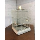 A white metal parrot cage, 62 x 41 x 41 cm [This lot is viewed at and cleared from John Clay