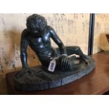 A 19th century green serpentine figure after the antique The Wounded Gaul 20 x 36 cm [This lot is