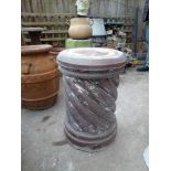 An Edwardian brown-glazed stoneware pedestal by Knowles Ltd of Darwen, spirally ribbed, with