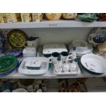 A quantity of Denby Greenwheat dinner wares including casserole dish and cover, cruets, serving bowl
