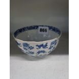 A Chinese Kangxi period blue and white porcelain bowl, painted with flowers and precious objects,