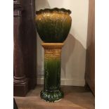A Victorian Staffordshire majolica jardiniere and stand 94 high x 38 cm diameter [This lot is viewed