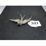 A large and attractive vintage brooch, as a swallow in flight, stamped 'sterling' and '935', and set