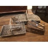 A mixed lot of a picnic basket, two wickerware trays, two bread knives and a Liberty's textile