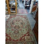 Four various rugs, including a small Hamadan, a Sumak with animal motifs, and a vintage Chinese
