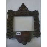 An elaborate Edwardian military frame in brass and silvered metal, inscribed Presented to the 4th