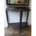 A Chinese carved hardwood two-tiered demi-lune console table, circa 1900, 86 x 45 x 87 cm [This