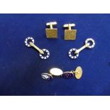 A pair of 9 ct gold square cuff links by Kutchinsky, London 1964; a pair of 9 ct and blue enamel