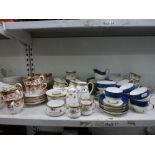 Three part tea services comprising of a blue and gilt decorated Paragon set, Royal Albert and