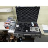 A Rolleiflex SL35E camera, lenses and accessories in aluminium carry case plus further Rolleiflex