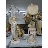 A figural three-branch table lamp depicting a stylish lady and a figural table lamp depicting two