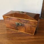 An early 19th century flame mahogany tea caddy with pressed brass embellishments, 30 x 15 x 18 cm [