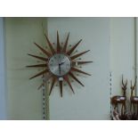 A sunburst clock by Seth Thomas. WE DO NOT TAKE CREDIT CARDS OR CASH. STORAGE IS CHARGED AFTER THE