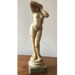 A turn of the last century alabaster figure of a nude woman circa 1900, 37 high x 9.5 cm square base