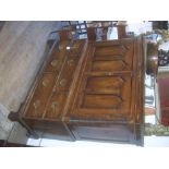 A 19th century oak and elm Carmarthenshire cupboard with two panelled doors having lancet arches,