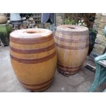Two Royal Doulton Lambeth glazed stoneware barrels 60 cm high [This lot is viewed at and cleared