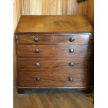 A 19th century mahogany estate fall-front bureau over a base with two short over three long drawers,