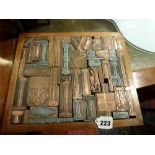 A selection of 45 various zinc and copper letter press blocks by Stockman & Siegler in an oak