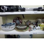 Three large blue and white Meissen dishes, a Japanese Imari plate, a quantity of Oriental wares