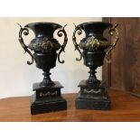 A pair of 19th century slate urns with brass decorative fittings, 20 x 11 x 32 cm [This lot is