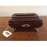 An early 19th century miniature leather sarcophagus box on gilt metal hairy paw feet 15 x 9 x 8