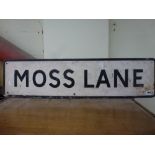 A metal Moss Lane road sign [top of s83] WE DO NOT ACCEPT CREDIT CARDS. STORAGE IS CHARGED AFTER THE