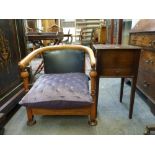 A mahogany sewing box on tapering legs and a low-seated easy chair with hoop arms WE DO NOT ACCEPT