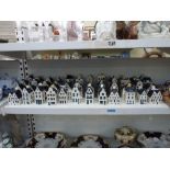 A collection of 48 KLM Bols ceramic houses, three retaining stoppers [S] WE DO NOT ACCEPT CREDIT