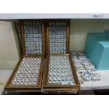 Approximately 190 Birchcroft China 'Love Is....' thimbles on wooden display stands and a set of 12